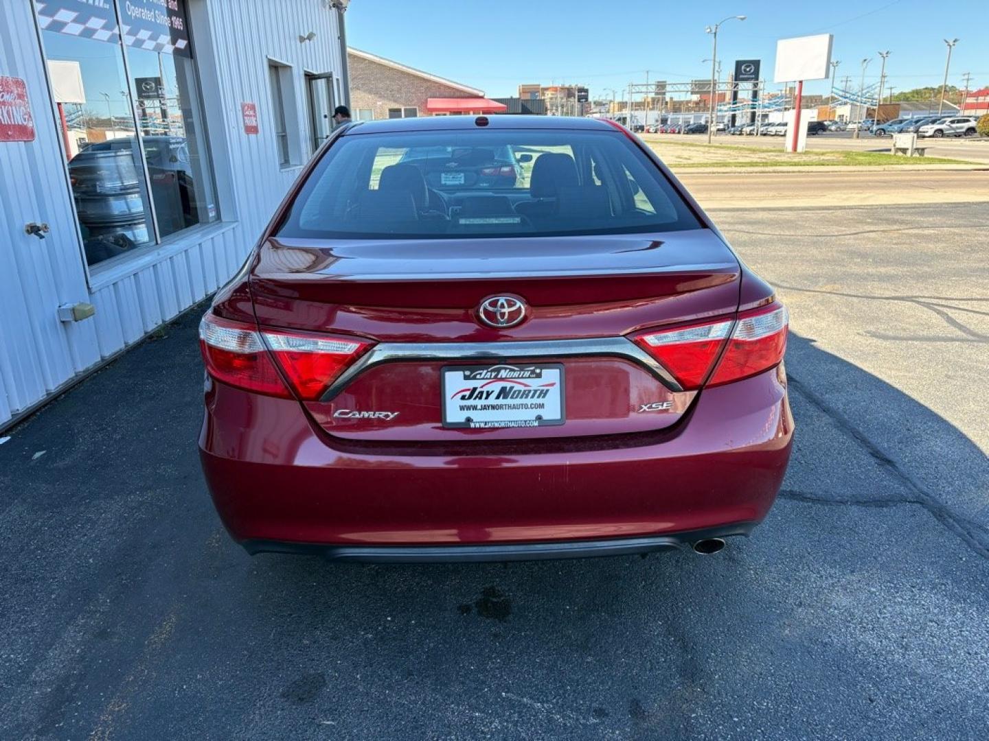 2016 RED TOYOTA CAMRY XSE (4T1BF1FK7GU) with an 2.5L engine, Automatic transmission, located at 501 E. Columbia St., Springfield, OH, 45503, (800) 262-7122, 39.925262, -83.801796 - **2016 Toyota Camry XSE - Only 92K Miles, 26 Service Records and New Tires!** Check out this SHARP 2016 Toyota Camry XSE! Powered by a fuel-efficient 2.5L 4-cylinder engine, this sporty sedan offers the perfect combination of comfort, reliability, and style! With only 92K miles, 2 previous owne- Photo#2