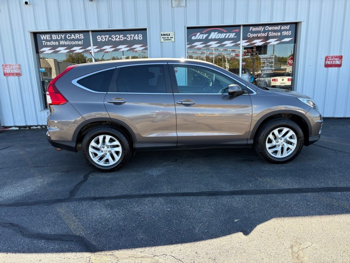 2016 BROWN HONDA CR-V EX (2HKRM4H5XGH) with an 2.4L engine, Continuously Variable transmission, located at 501 E. Columbia St., Springfield, OH, 45503, (800) 262-7122, 39.925262, -83.801796 - **2016 Honda CR-V EX - 1 Owner, 23 Service Records and AWD!** Check out this sharp 2016 Honda CR-V EX! Powered by a fuel-efficient 2.4L 4-cylinder engine with All-Wheel Drive, this versatile SUV offers comfort, reliability, and excellent everyday practicality! With just **1 Previous Owner and 2- Photo#1
