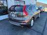 2016 BROWN HONDA CR-V EX (2HKRM4H5XGH) with an 2.4L engine, Continuously Variable transmission, located at 501 E. Columbia St., Springfield, OH, 45503, (800) 262-7122, 39.925262, -83.801796 - **2016 Honda CR-V EX - 1 Owner, 23 Service Records and AWD!** Check out this sharp 2016 Honda CR-V EX! Powered by a fuel-efficient 2.4L 4-cylinder engine with All-Wheel Drive, this versatile SUV offers comfort, reliability, and excellent everyday practicality! With just **1 Previous Owner and 2- Photo#2