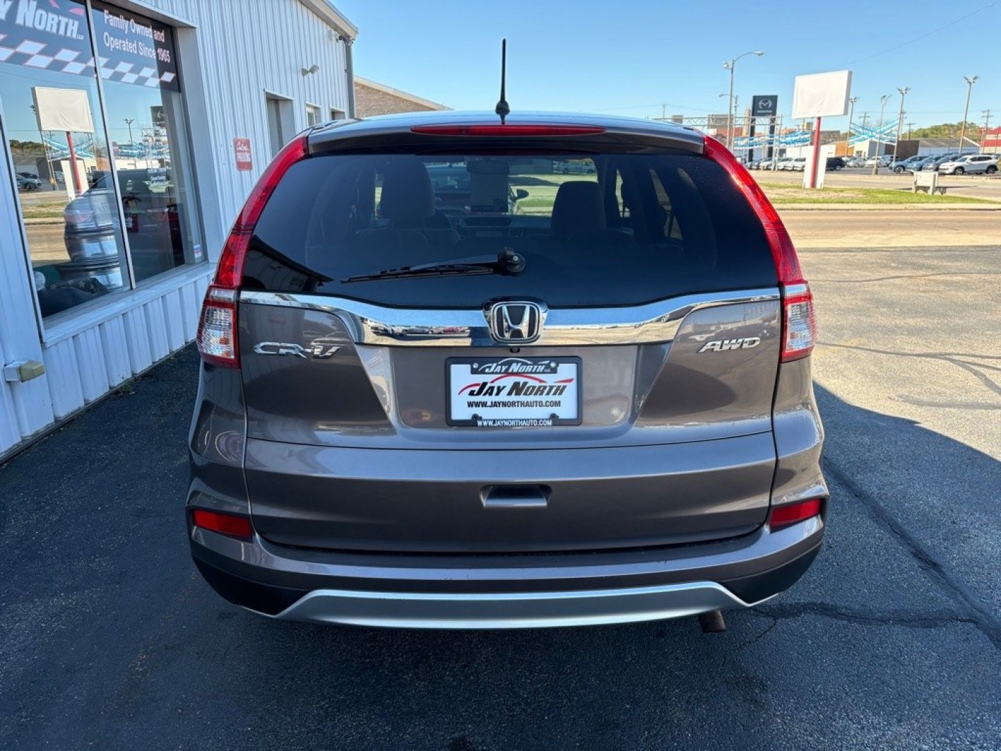 2016 BROWN HONDA CR-V EX (2HKRM4H5XGH) with an 2.4L engine, Continuously Variable transmission, located at 501 E. Columbia St., Springfield, OH, 45503, (800) 262-7122, 39.925262, -83.801796 - **2016 Honda CR-V EX - 1 Owner, 23 Service Records and AWD!** Check out this sharp 2016 Honda CR-V EX! Powered by a fuel-efficient 2.4L 4-cylinder engine with All-Wheel Drive, this versatile SUV offers comfort, reliability, and excellent everyday practicality! With just **1 Previous Owner and 2- Photo#3
