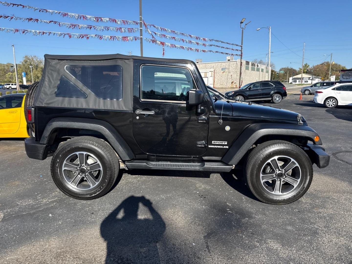 2016 BLACK JEEP WRANGLER SPORT (1C4AJWAG7GL) with an 3.6L engine, 6-Speed Manual transmission, located at 501 E. Columbia St., Springfield, OH, 45503, (800) 262-7122, 39.925262, -83.801796 - **2016 Jeep Wrangler Sport 4x4 - 6-Speed Manual and Extensive Recent Maintenance!** Check out this 2016 Jeep Wrangler Sport! Powered by a 3.6L V6 engine paired with a desirable 6-speed manual transmission and 4-Wheel Drive, this Jeep delivers the classic Wrangler driving experience! **Featur- Photo#1