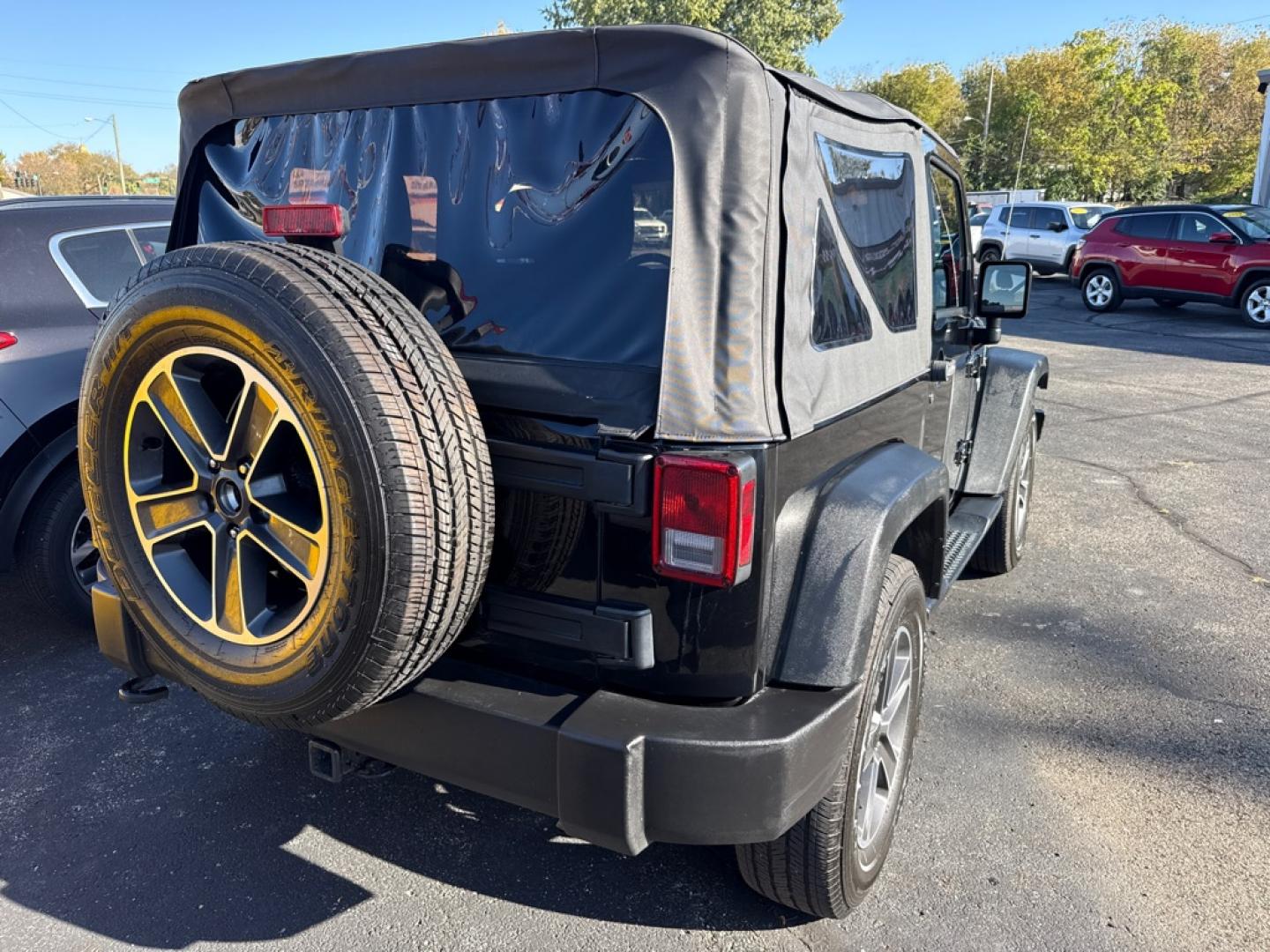 2016 BLACK JEEP WRANGLER SPORT (1C4AJWAG7GL) with an 3.6L engine, 6-Speed Manual transmission, located at 501 E. Columbia St., Springfield, OH, 45503, (800) 262-7122, 39.925262, -83.801796 - **2016 Jeep Wrangler Sport 4x4 - 6-Speed Manual and Extensive Recent Maintenance!** Check out this 2016 Jeep Wrangler Sport! Powered by a 3.6L V6 engine paired with a desirable 6-speed manual transmission and 4-Wheel Drive, this Jeep delivers the classic Wrangler driving experience! **Featur- Photo#5