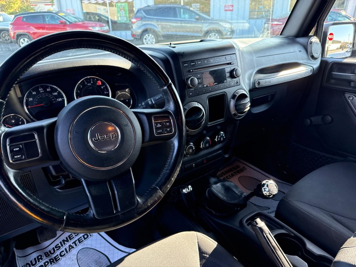 2016 BLACK JEEP WRANGLER SPORT (1C4AJWAG7GL) with an 3.6L engine, 6-Speed Manual transmission, located at 501 E. Columbia St., Springfield, OH, 45503, (800) 262-7122, 39.925262, -83.801796 - **2016 Jeep Wrangler Sport 4x4 - 6-Speed Manual and Extensive Recent Maintenance!** Check out this 2016 Jeep Wrangler Sport! Powered by a 3.6L V6 engine paired with a desirable 6-speed manual transmission and 4-Wheel Drive, this Jeep delivers the classic Wrangler driving experience! **Featur- Photo#6