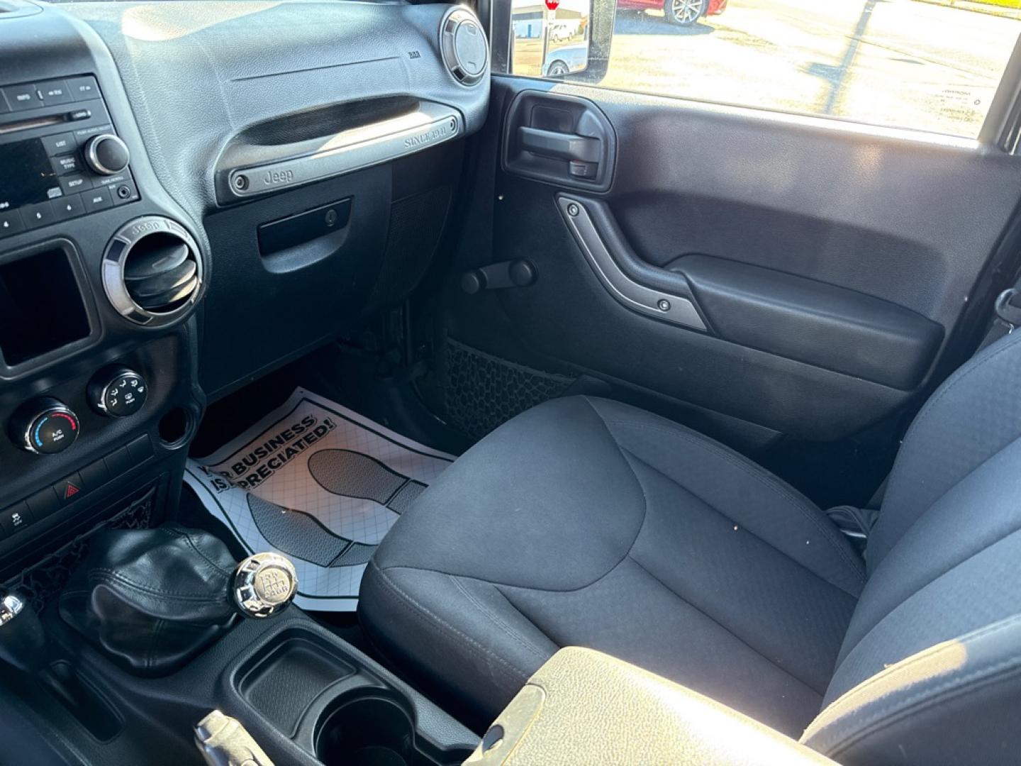 2016 BLACK JEEP WRANGLER SPORT (1C4AJWAG7GL) with an 3.6L engine, 6-Speed Manual transmission, located at 501 E. Columbia St., Springfield, OH, 45503, (800) 262-7122, 39.925262, -83.801796 - **2016 Jeep Wrangler Sport 4x4 - 6-Speed Manual and Extensive Recent Maintenance!** Check out this 2016 Jeep Wrangler Sport! Powered by a 3.6L V6 engine paired with a desirable 6-speed manual transmission and 4-Wheel Drive, this Jeep delivers the classic Wrangler driving experience! **Featur- Photo#8