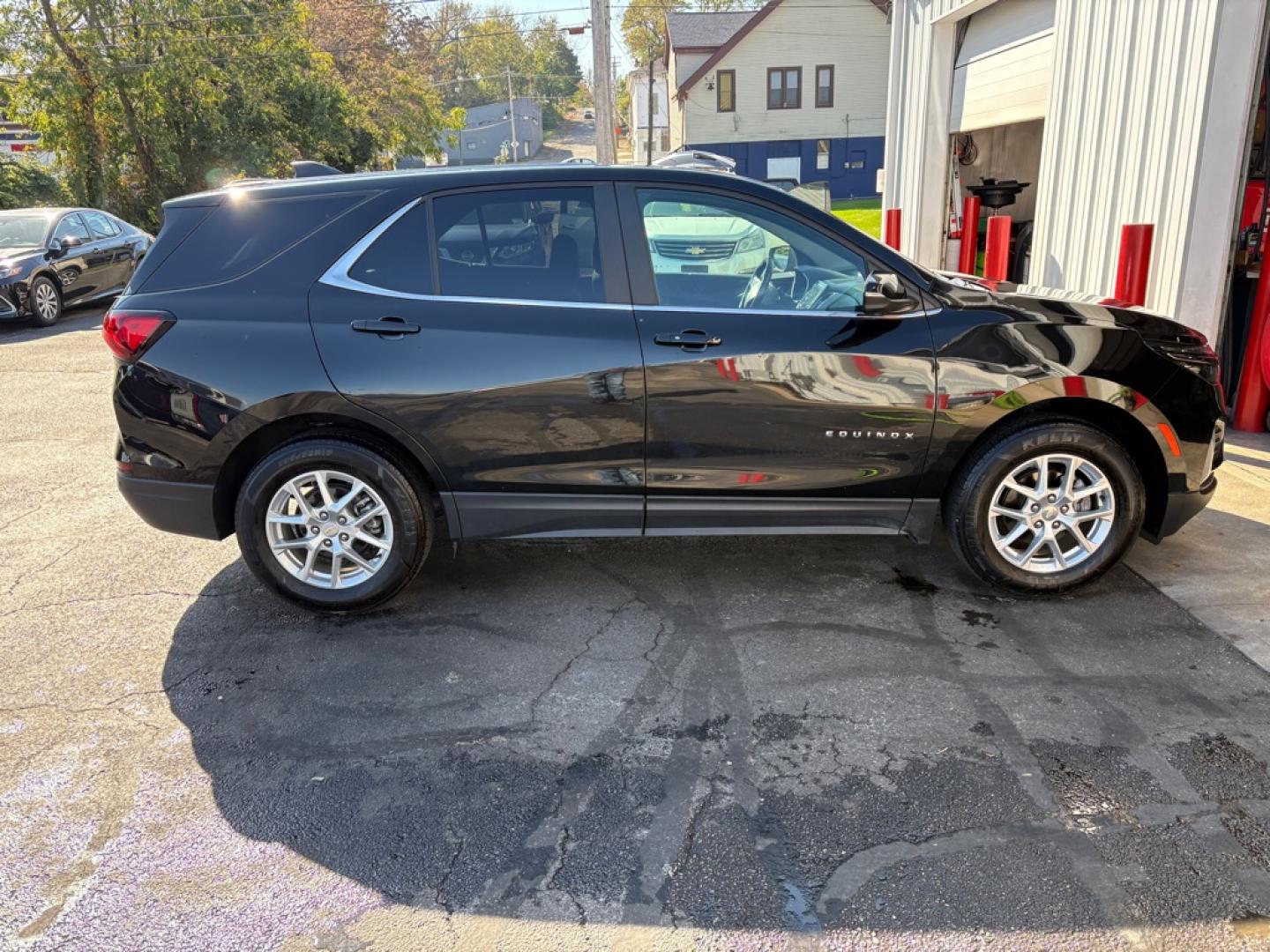 2023 BLACK CHEVROLET EQUINOX LT (3GNAXUEG9PL) with an 1.5L engine, Automatic transmission, located at 501 E. Columbia St., Springfield, OH, 45503, (800) 262-7122, 39.925262, -83.801796 - **2023 Chevrolet Equinox LT AWD - 1 OWNER!** This 2023 Chevrolet Equinox LT offers the perfect combination of comfort, technology, and versatility! Equipped with a fuel-efficient 1.5L Turbo engine and All-Wheel Drive, it's a great SUV for everyday driving! **FEATURES:** Remote Start, Heated Se- Photo#1