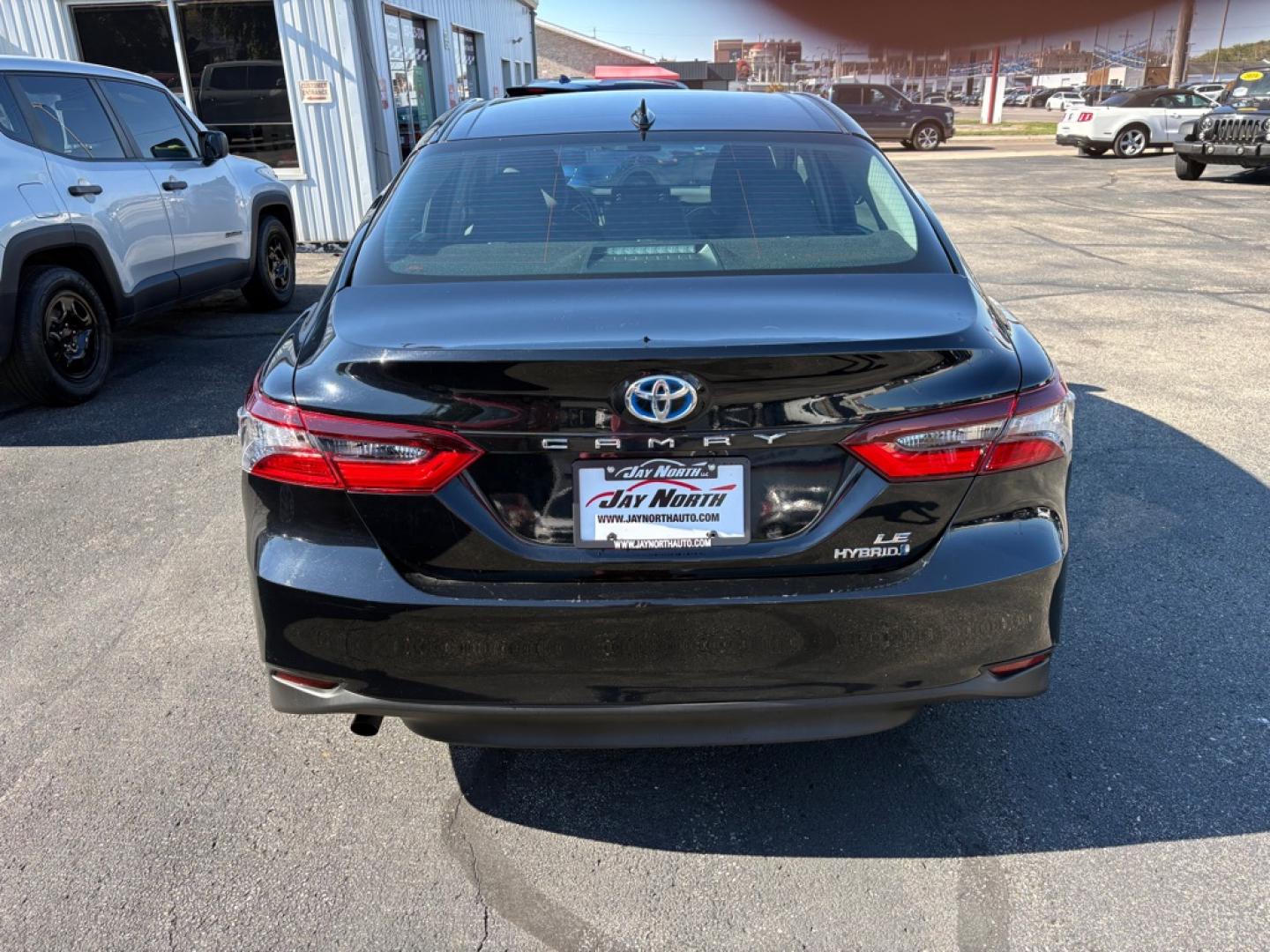 2023 BLACK TOYOTA CAMRY LE HYBRID (4T1C31AK5PU) with an 2.5L engine, Continuously Variable transmission, located at 501 E. Columbia St., Springfield, OH, 45503, (800) 262-7122, 39.925262, -83.801796 - **2023 Toyota Camry Hybrid LE - 1 Owner, Clean CARFAX and 17 Service Records!** Check out this 2023 Toyota Camry Hybrid LE! Powered by a fuel-efficient 2.5L 4-cylinder hybrid engine, this Camry offers a smooth, comfortable ride, excellent fuel economy, and Toyota's proven hybrid technology!- Photo#3