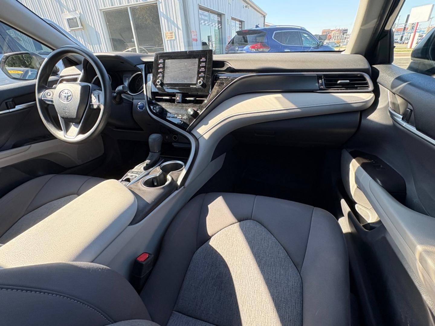 2023 BLACK TOYOTA CAMRY LE HYBRID (4T1C31AK5PU) with an 2.5L engine, Continuously Variable transmission, located at 501 E. Columbia St., Springfield, OH, 45503, (800) 262-7122, 39.925262, -83.801796 - **2023 Toyota Camry Hybrid LE - 1 Owner, Clean CARFAX and 17 Service Records!** Check out this 2023 Toyota Camry Hybrid LE! Powered by a fuel-efficient 2.5L 4-cylinder hybrid engine, this Camry offers a smooth, comfortable ride, excellent fuel economy, and Toyota's proven hybrid technology!- Photo#19